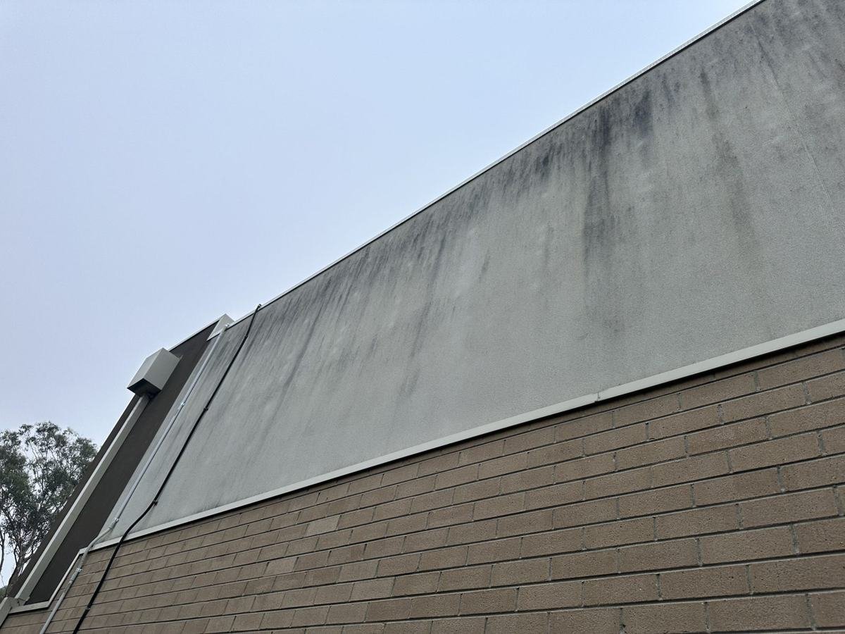 Before: the same wall